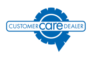 Blue ribbon-shaped logo with the words "Customer Care Dealer" in capital letters, with "care" highlighted in bold inside a circular gear design.