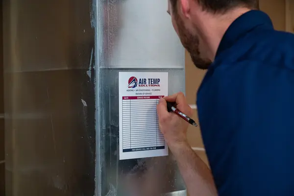 Tech writing on branded Air Temp paper
