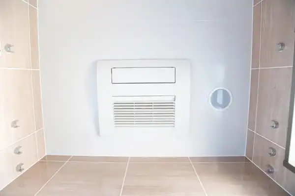 Dehumidifier on a white wall in a residential home